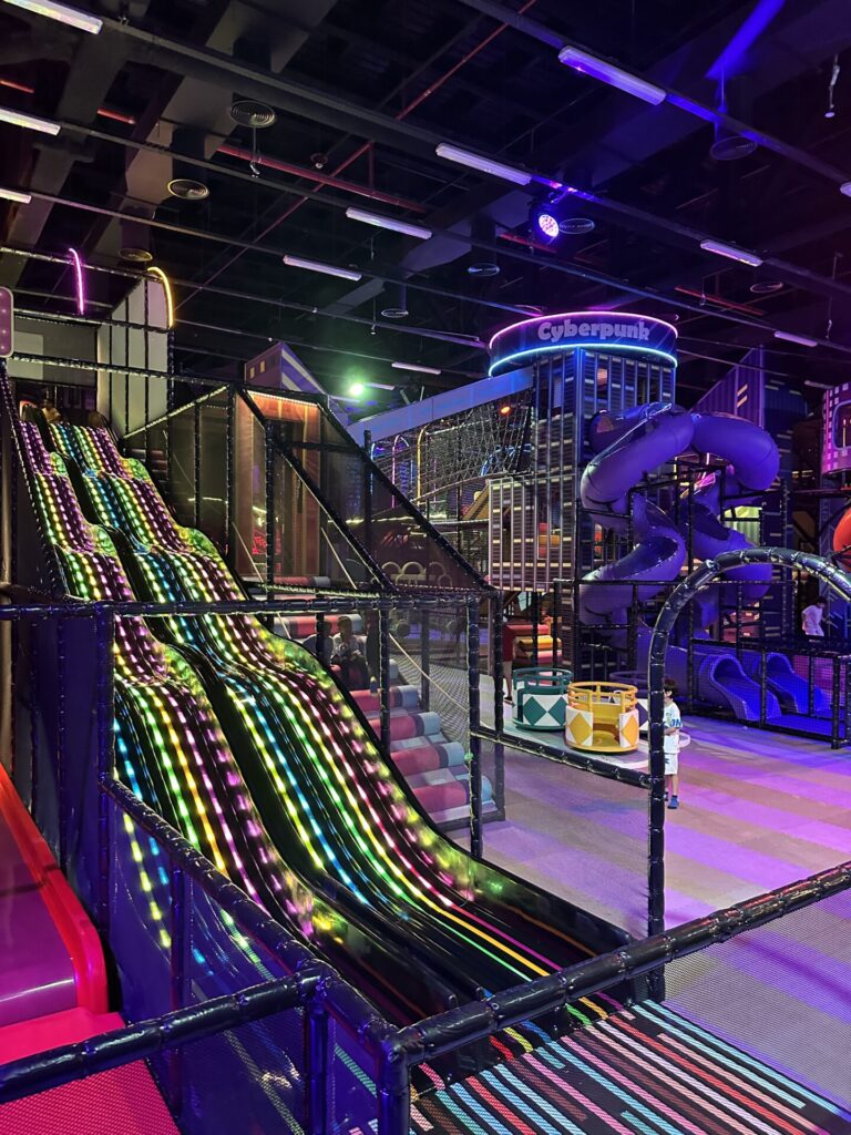 Slide in Neon Galaxy amusement park